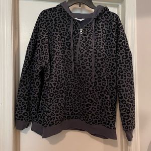 Animal print sweatshirt with half zip